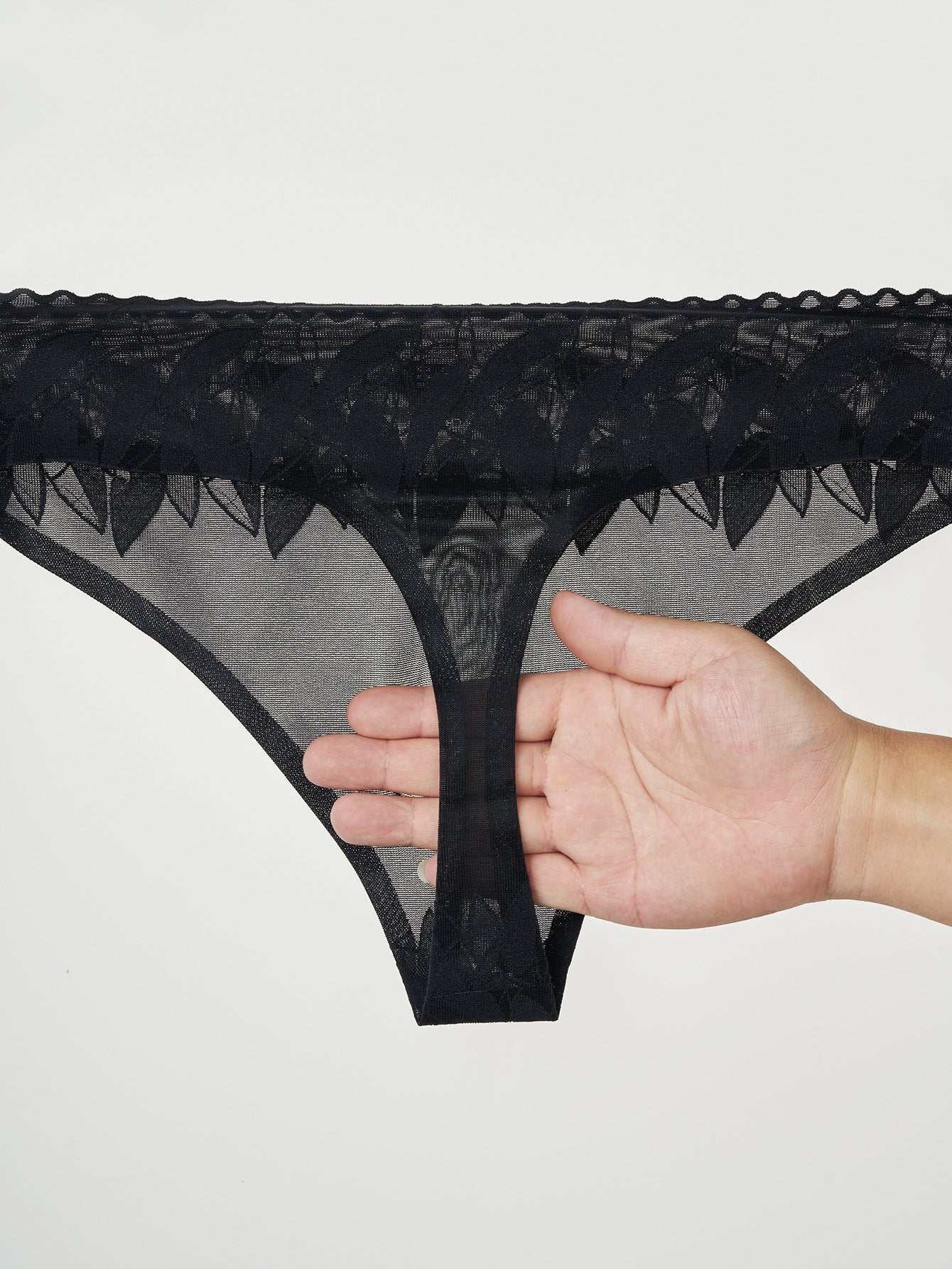 4 Pack Men's High-Stretch & Low-Rise Lace Trim Large Pouch Thongs | dmunderwear detail image 10