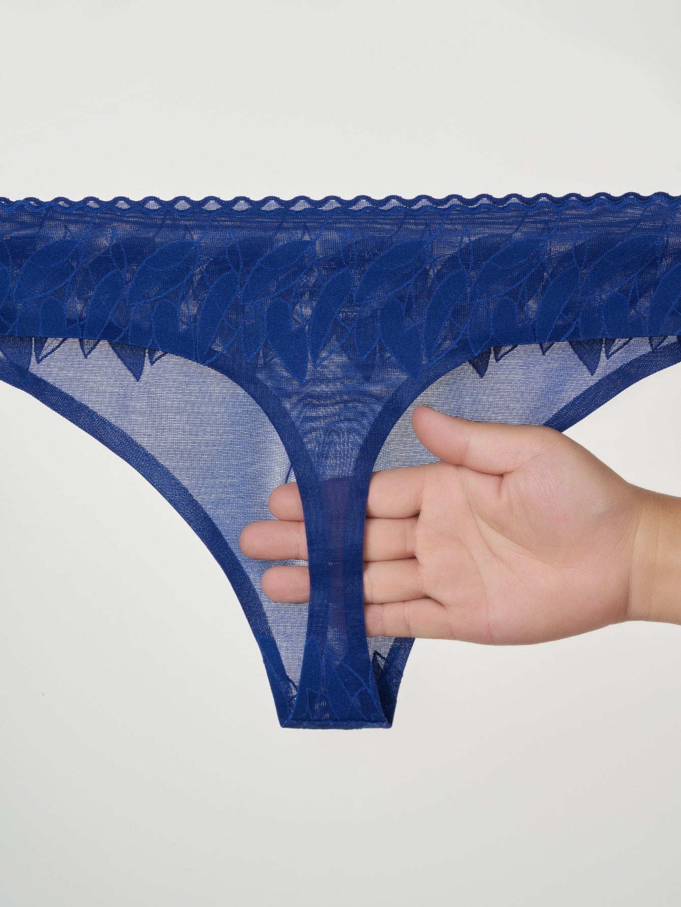 4 Pack Men's High-Stretch & Low-Rise Lace Trim Large Pouch Thongs | dmunderwear detail image 13