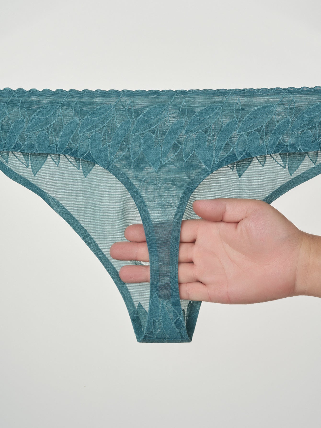 4 Pack Men's High-Stretch & Low-Rise Lace Trim Large Pouch Thongs | dmunderwear detail image 15